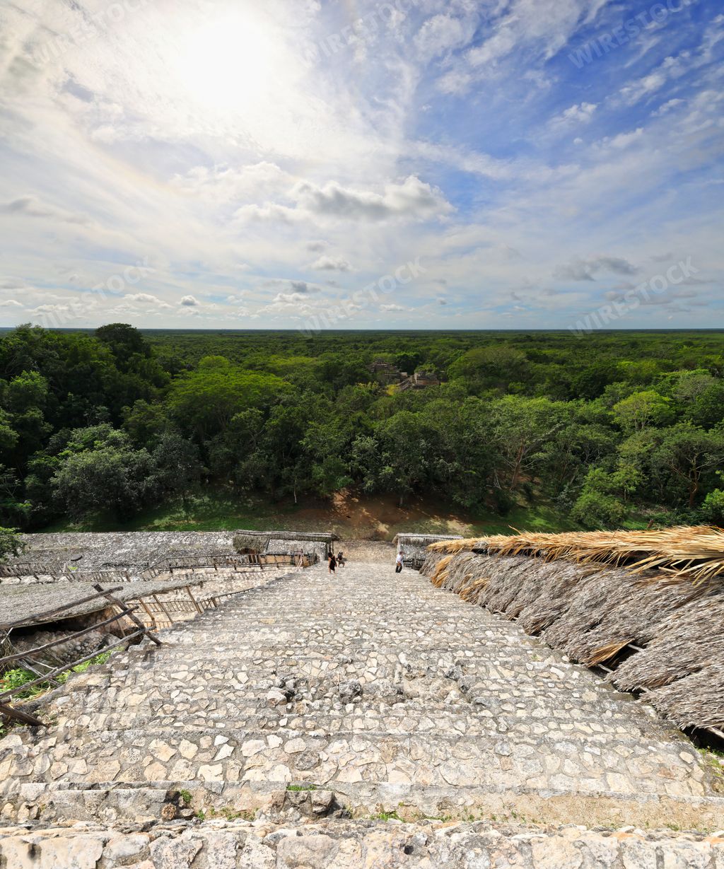 A vertical shot of the Maya pyramid ruins in Valladolid, Yucatan, Mexico
