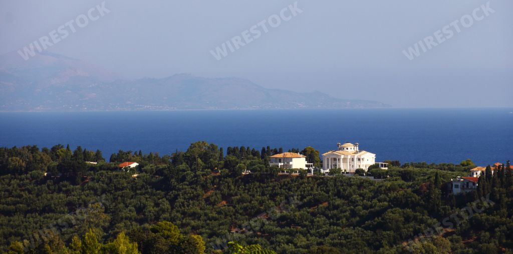 A beautiful view of white building on the cliff in Zakynthos Greece Island