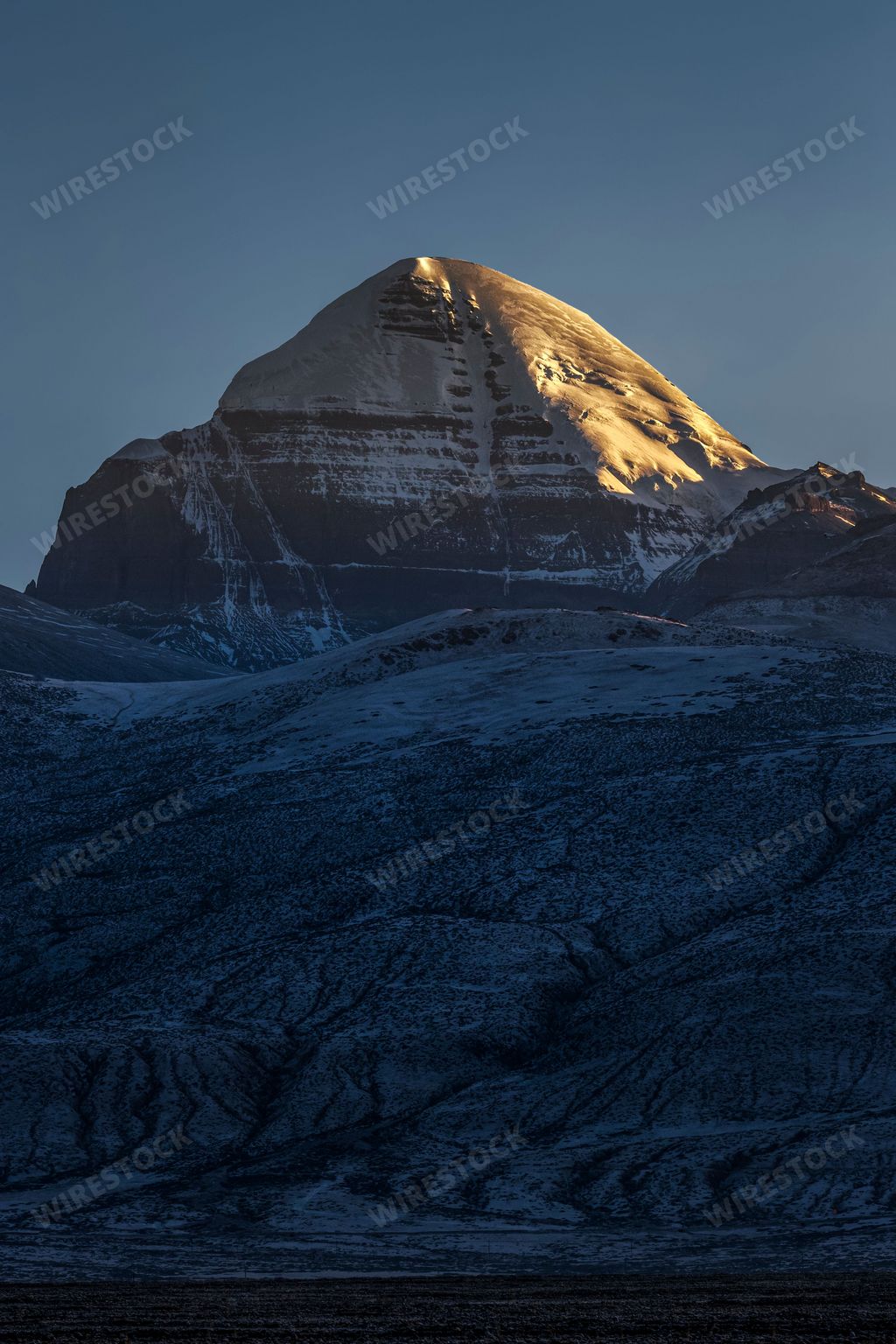 A vertical shot of sunrise with Mount Kailash in Taqin County, Ali Prefecture, Tibet, China