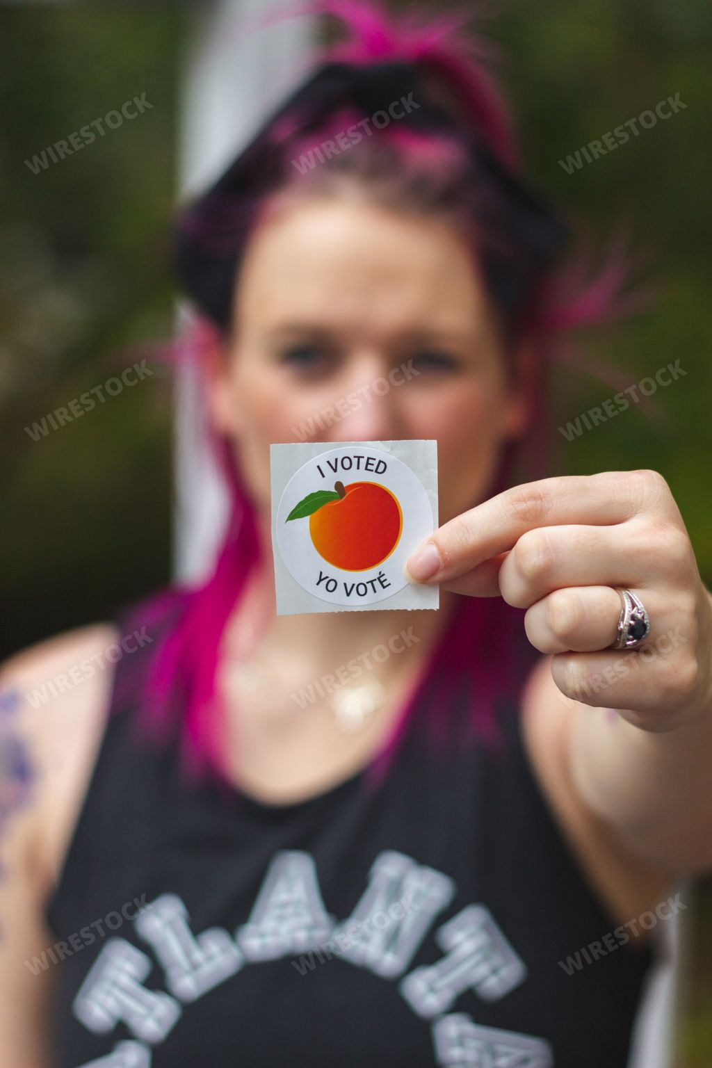 Lawrenceville, GA / United States - October 29 2020: A Georgia voter displays her "I Voted" sticker after voting in the 2020 Presidential Election.