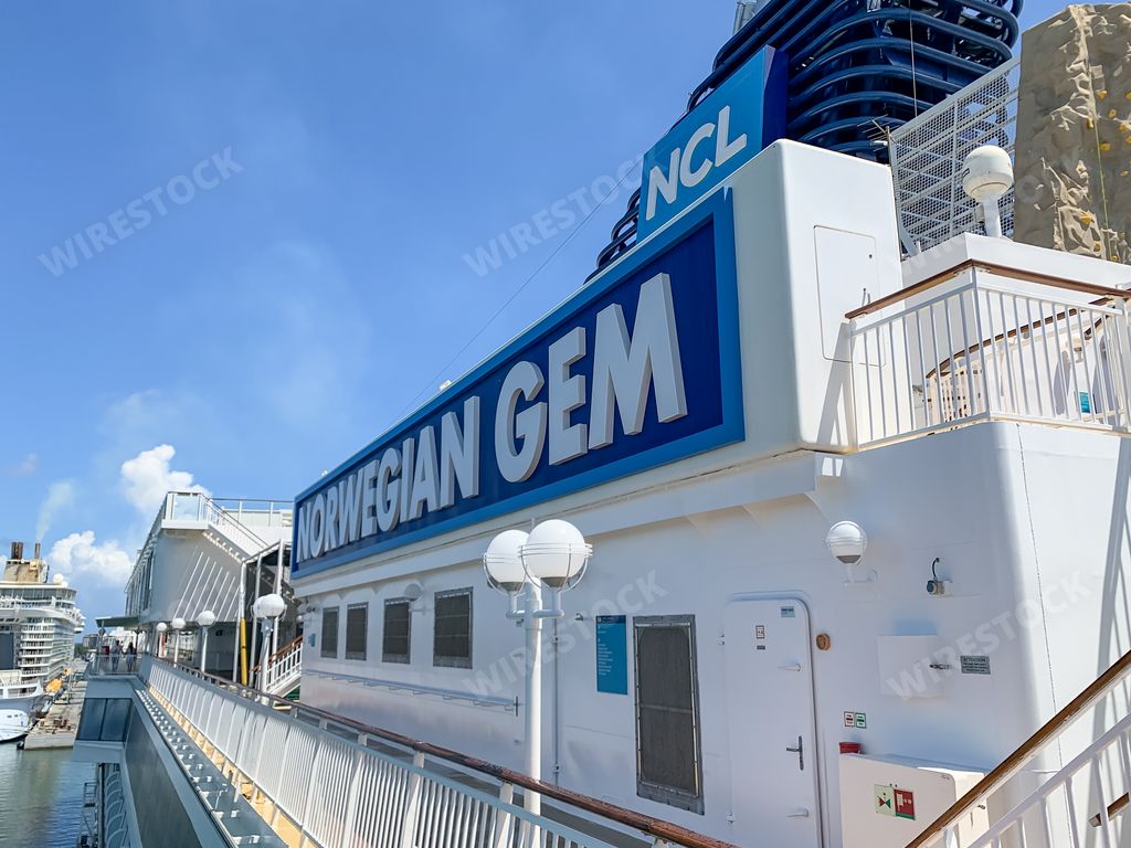 The Norwegian Cruise Lines logo on the funnel of a cruise ship in Miami, USA