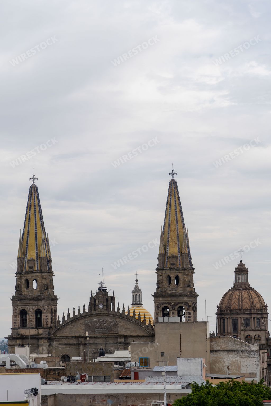 The exterior of Guadalajara Cathedral in Guadalajara, Mexico under cloudy sky