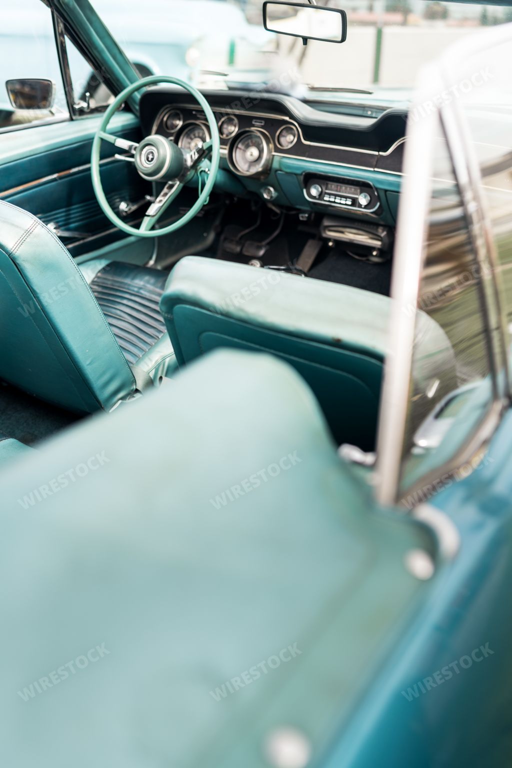 A vertical shot of a vintage cabriolet car