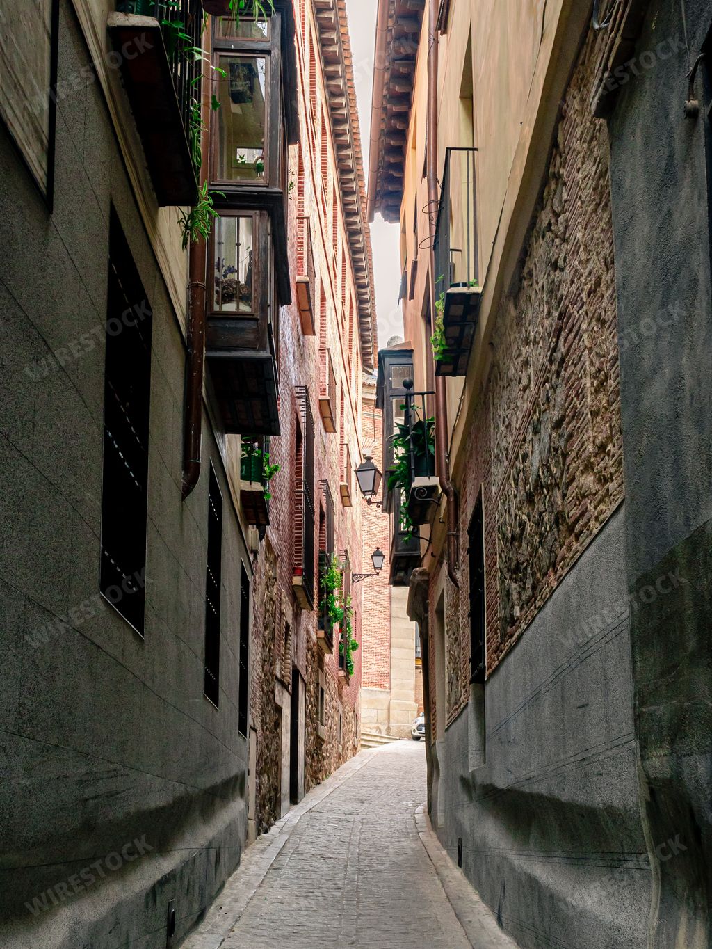 A vertical shot of the beautiful streets of Toledo in Spain