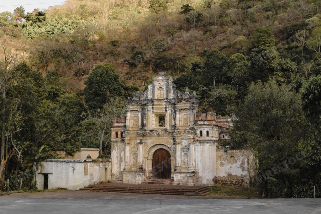 A vertical shot of the Holy Cross Hermitage ruins in the city of Antigua Guatemala, Central America