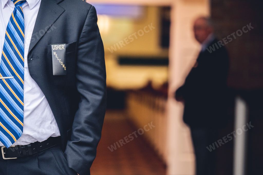 A shot of the faceless businessman in an elegant suit