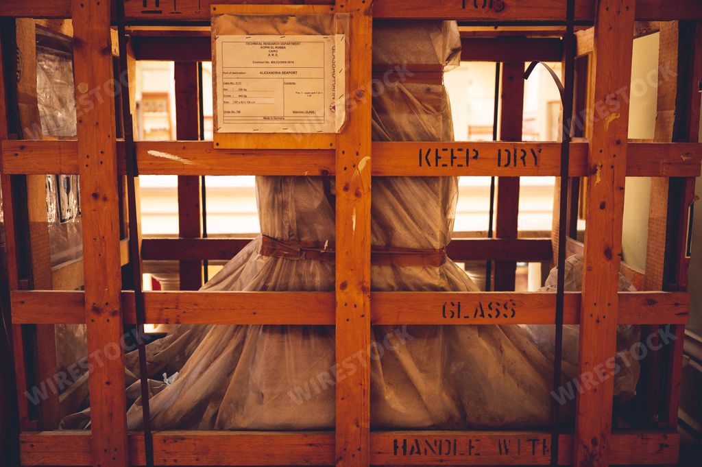 A closeup of a wooden crate protecting an important ancient artifact in the Egyptian Museum in Cairo
