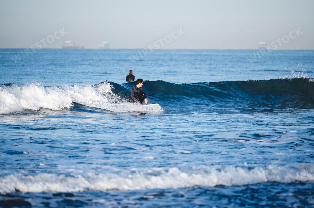 The surfer on the wave. Newport Beach, California.