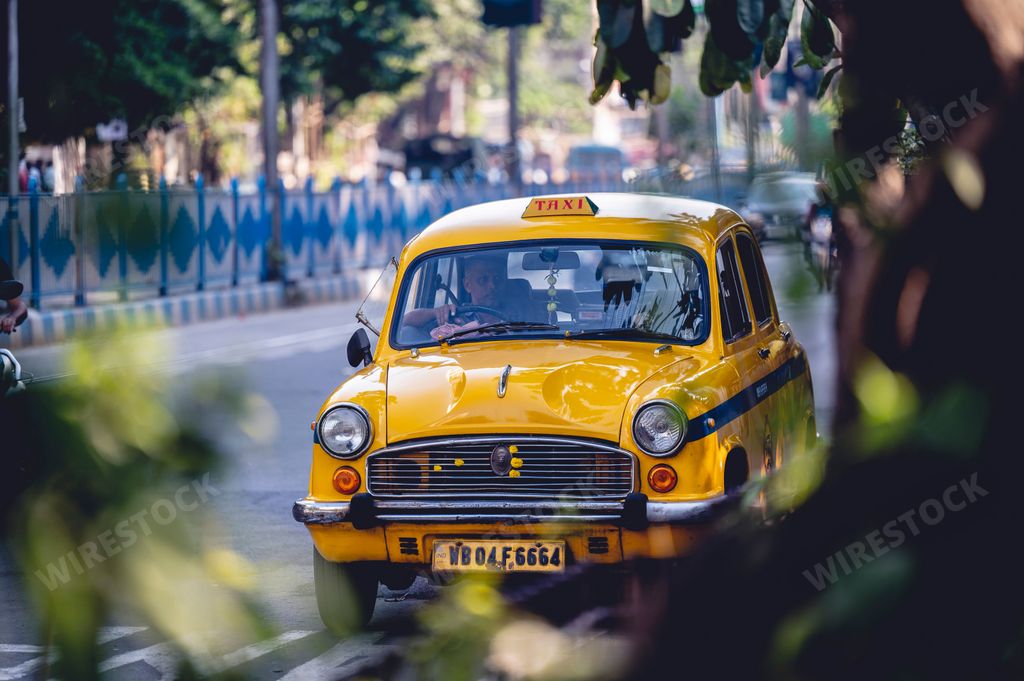A local Yellow taxi on the street in Kolkata India
