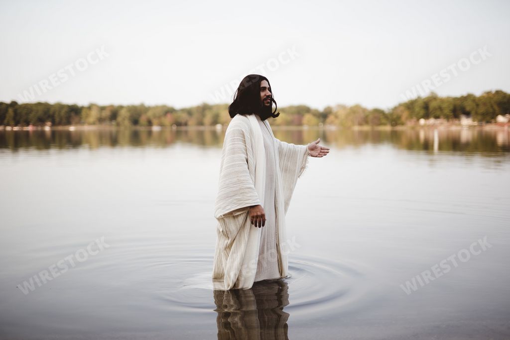 The Jesus Christ walking in the water with his hand up