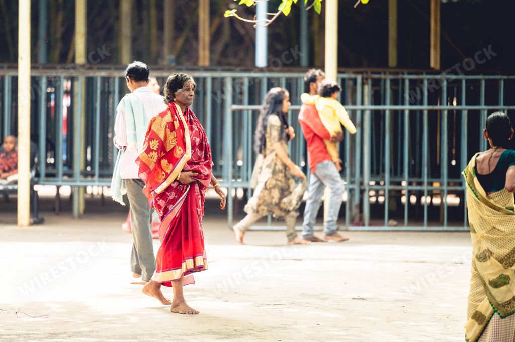 The Indian Hindu women worshiping at Hindu temple in traditional clothing in Kolkata, India
