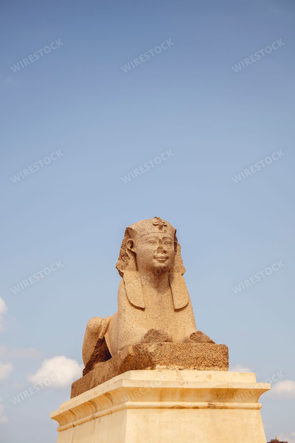 The sphinx statue in Alexandria, Egypt, against the background of a blue sky. Vertical footage.
