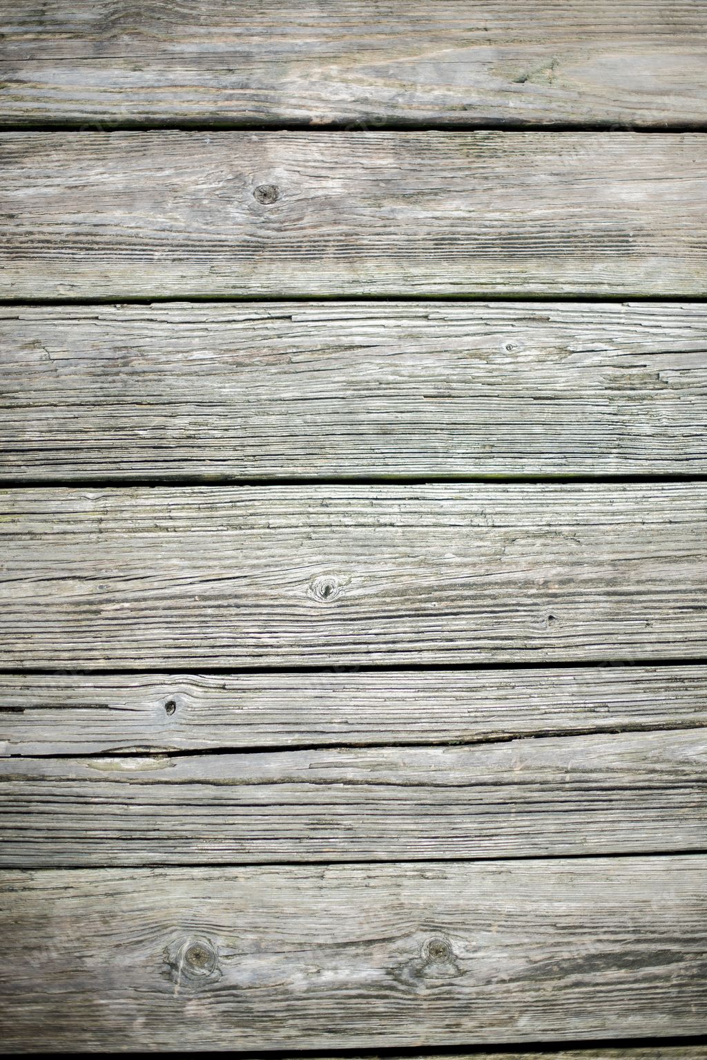 A vertical shot of a wall made of horizontal wooden planks - perfect for a cool wallpaper background