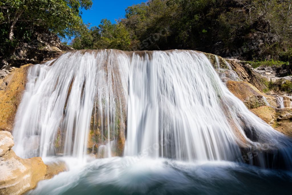 A scenic view of the waterfall in Air Terjun Tanggedu, Sumba Island, Indonesia