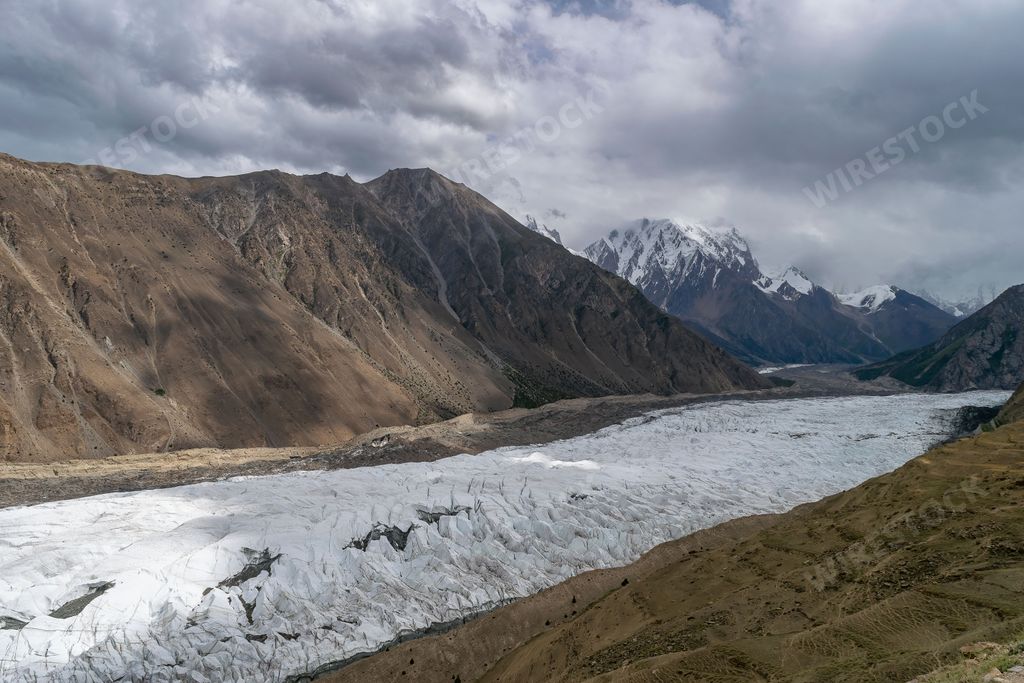 A scenic view of Barpu Glacier against Rush Lake, Karakoram highway, Pakistan