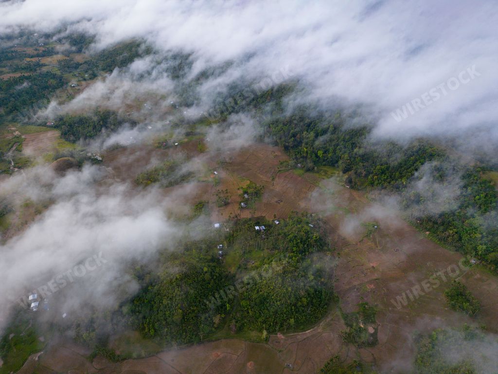 An aerial view of the lush green Chocolate Hills of Bohol Island, Philippines