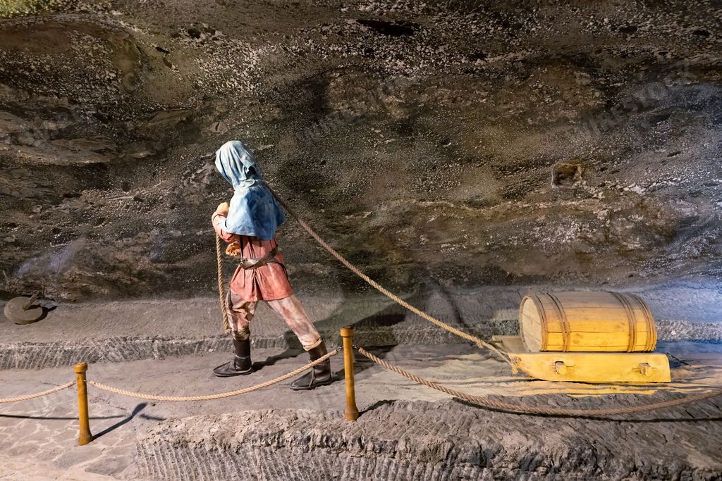A miner carrying trolley statue in Wieliczka Salt Mine museum in Wieliczka, Poland