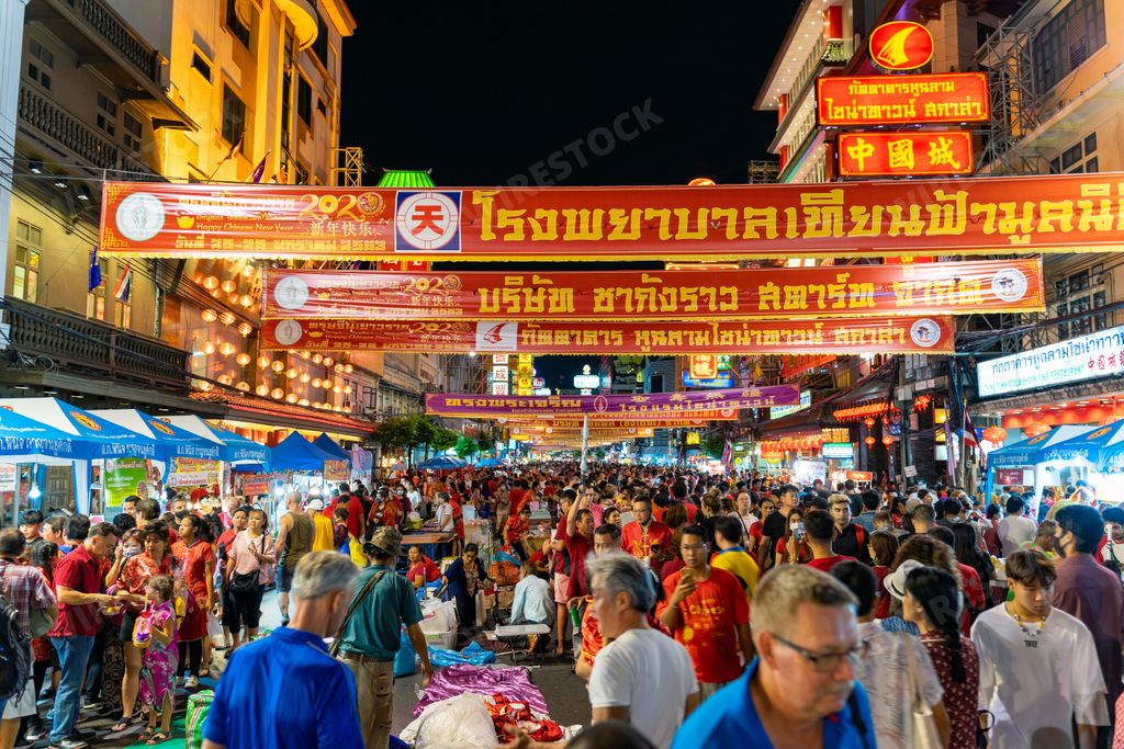 People in the streets of Chinatown for Chinese New Year in Bangkok, Thailand