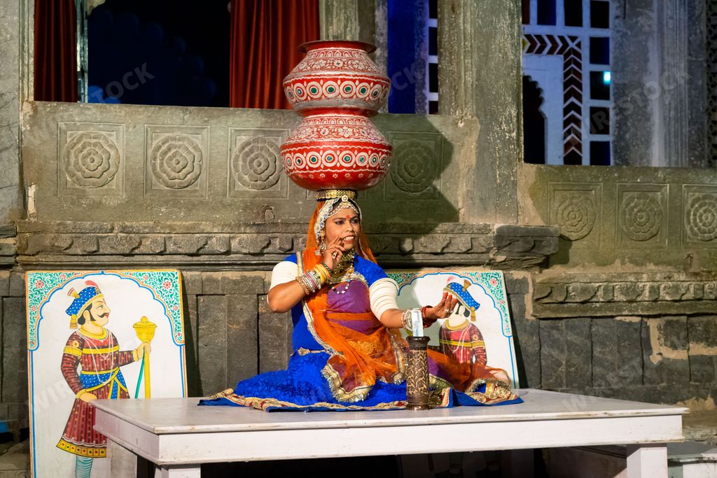 An Indian woman performing during the Dharohar Folk Dance Show in Udaipur, India