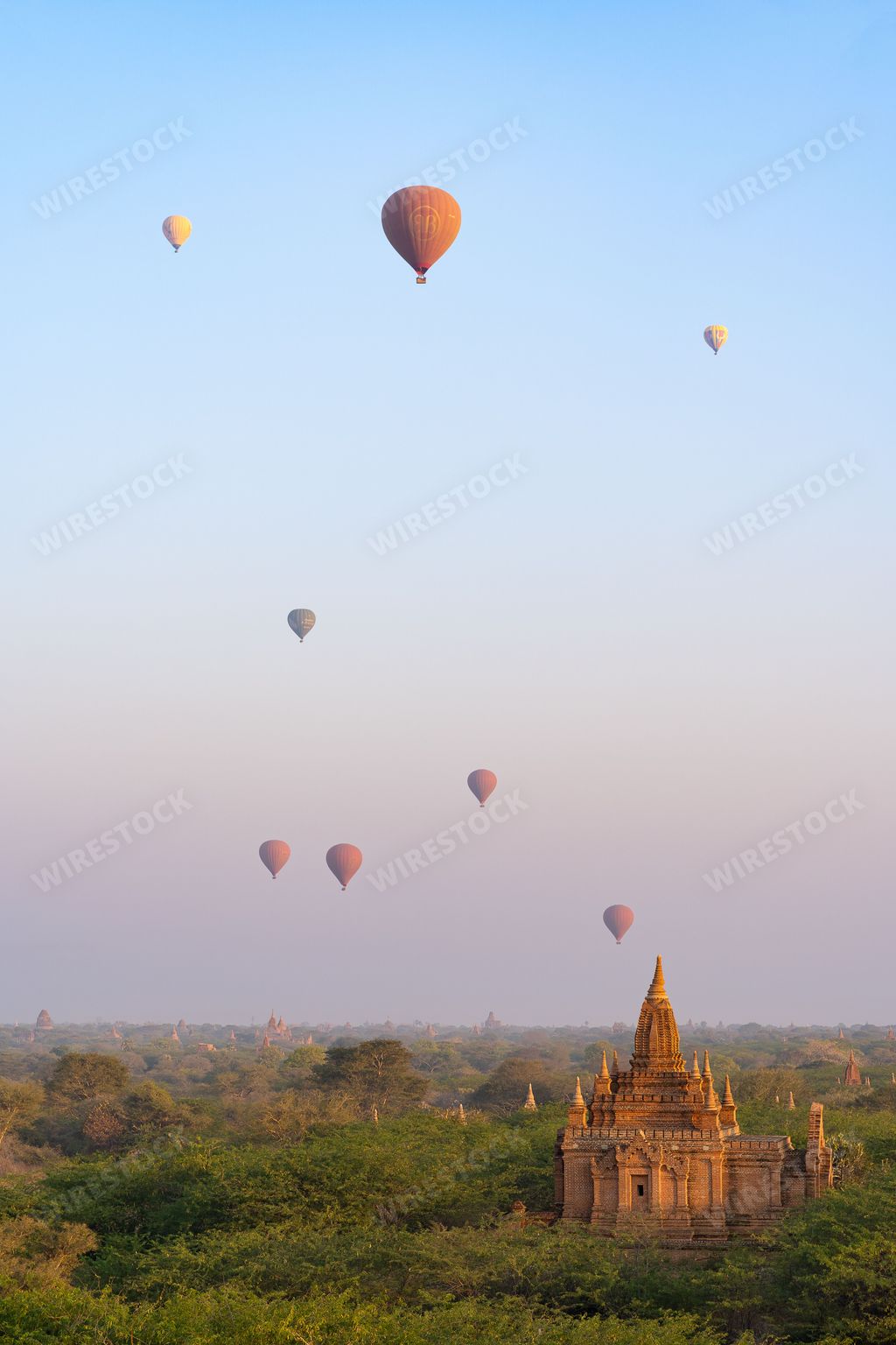 A scenic sunrise with hot air balloons in Old Bagan, Myanmar (Burma)