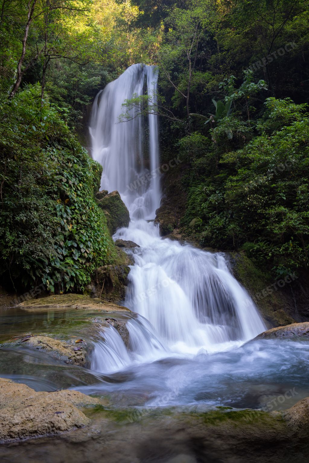 A vertical shot of Air Terjun Lokomboro waterfall, Sumba Island, Indonesia