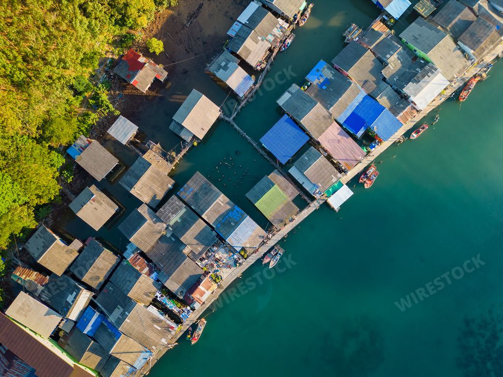 A top view of the Ao Salat floating fishing village on the sea in Thailand during the daytime