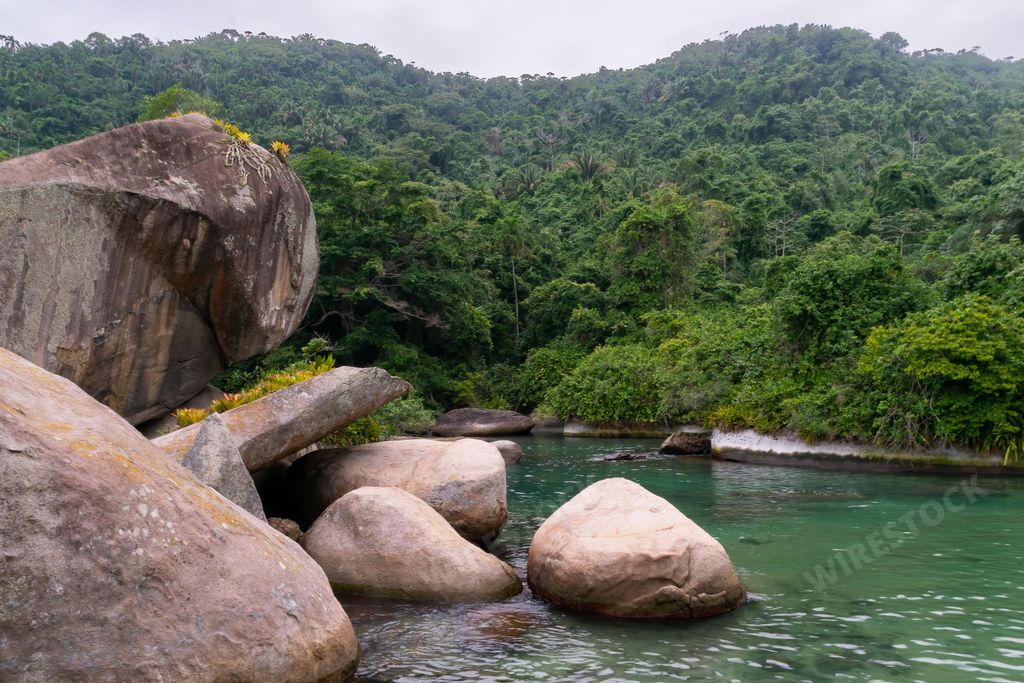 A beautiful landscape of green Cachadaco Natural Pool in Trindade Village