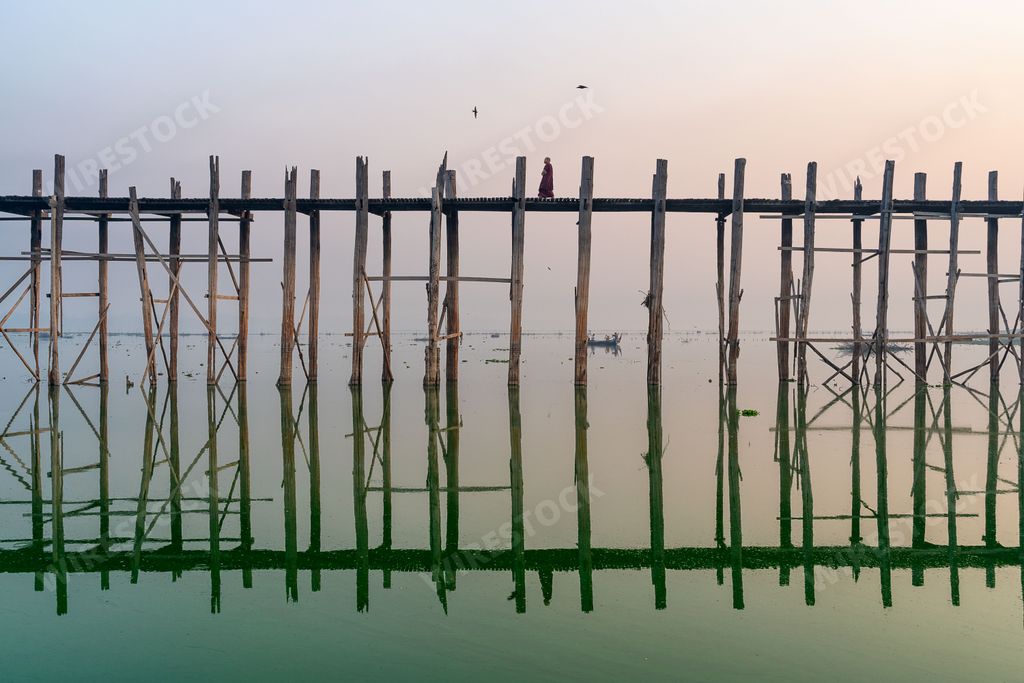 A scenic sunrise at U Bein Bridge in Mandalay, Myanmar (Burma)
