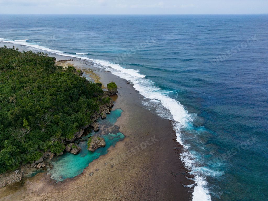 An aerial view of Magpupungko Tidal Pool, Siargao Island, Philippines