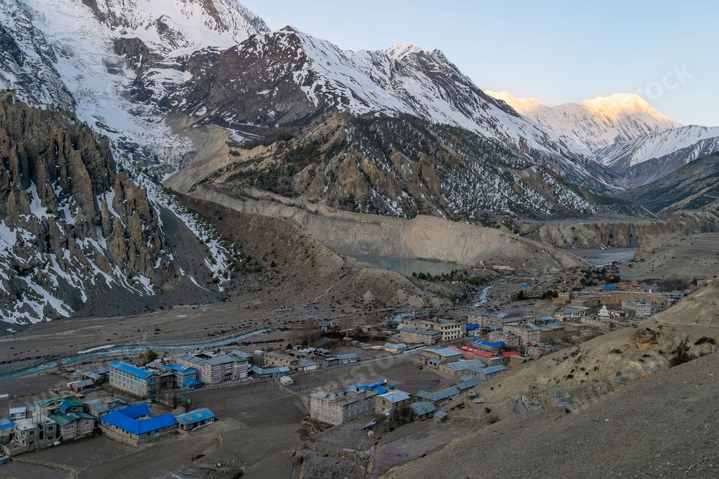 A high shot of Manang district with blue houses under Annapurna circuit trek, Nepal
