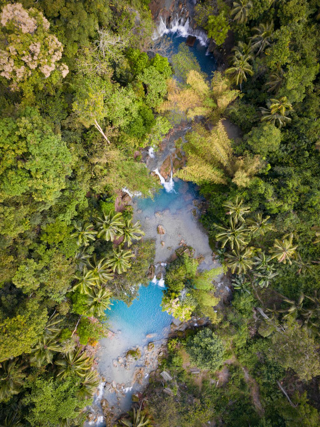 A scenic view of Cambugahay Falls, Siquijor island, Philippines