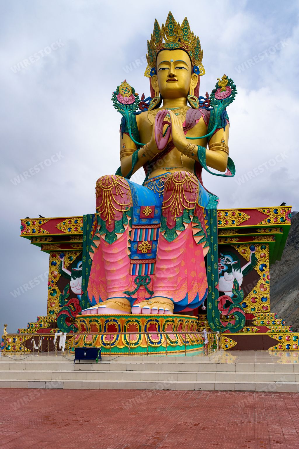 A vertical shot of Maitreya Buddha close to Diskit Gompa Monastery