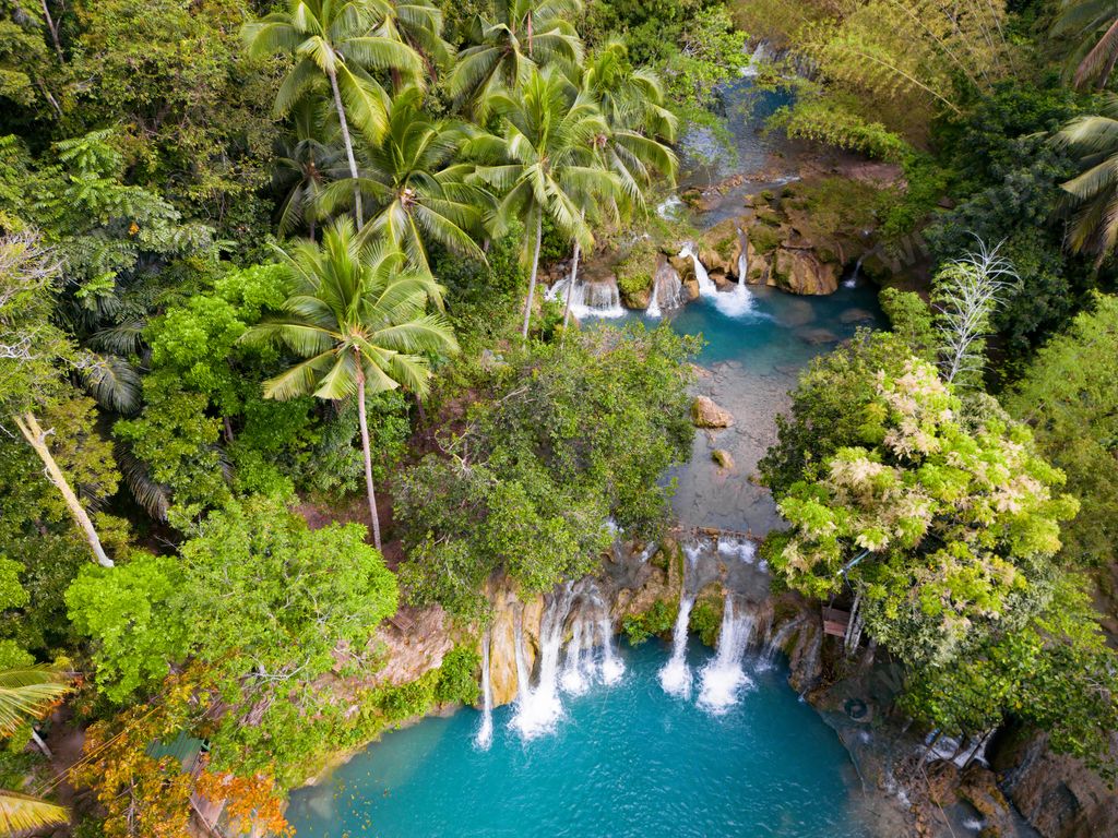 A scenic view of Cambugahay Falls, Siquijor island, Philippines
