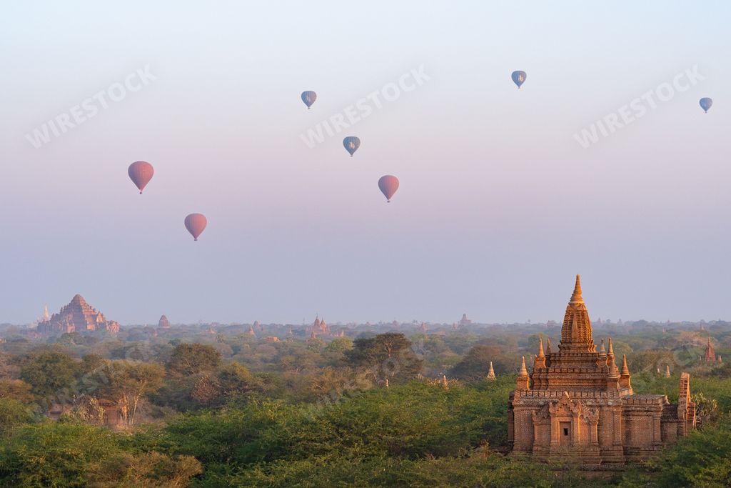 A scenic sunrise with hot air balloons in Old Bagan, Myanmar (Burma)