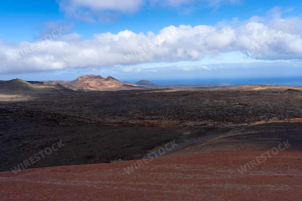 An aerial view of beautiful mountains in Timanfaya National Park, Lanzarote, Spain