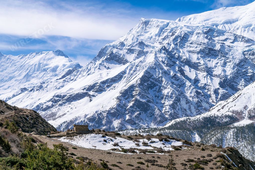 A landscape view of the snowy mountains at Churi Letdar hamlet, Annapurna circuit trek, Nepal