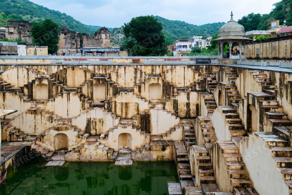 A beautiful shot of the Chand Baori or Abhaneri Step Well with reflection in the water,Rajasthan,India