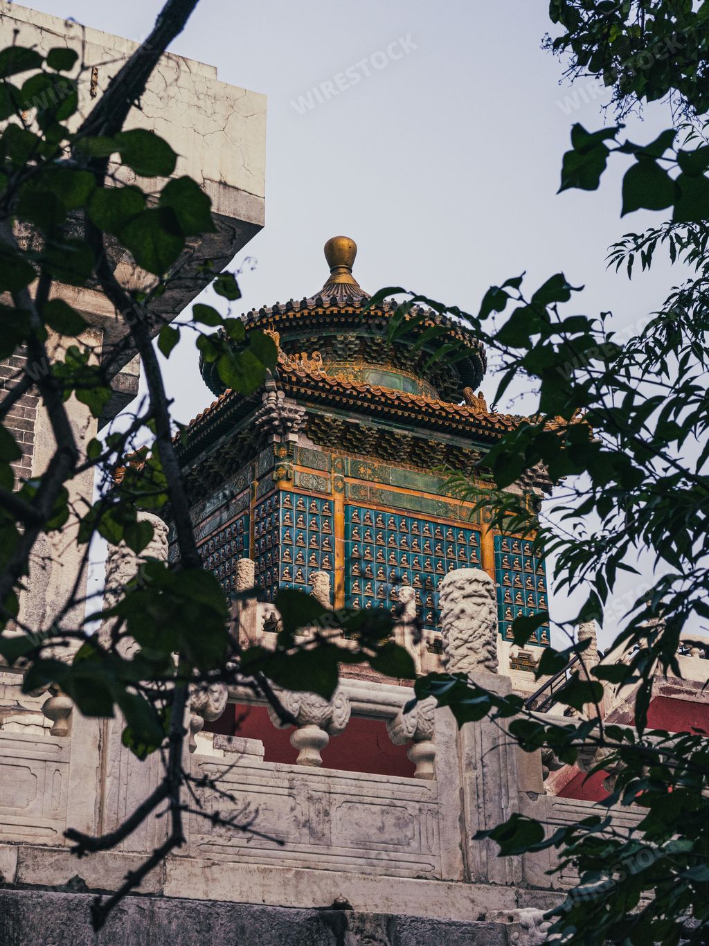 A vertical shot of the White Stupa Temple in Beihai Park in Beijing, China