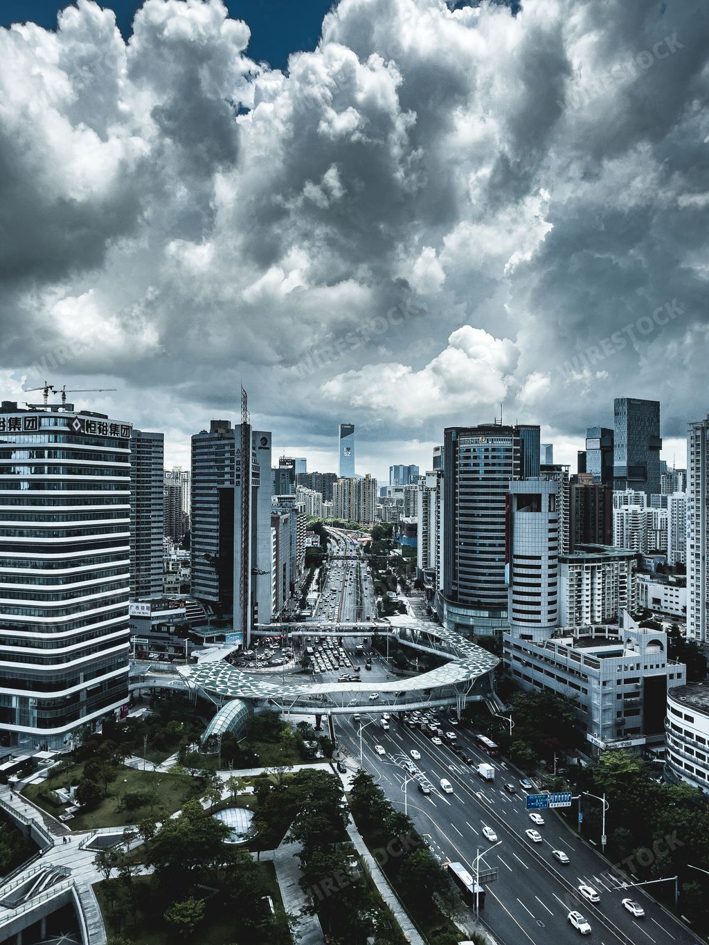 A beautiful view of a cityscape under a cloudy sky in Shenzhen City, Guangdong Province, China