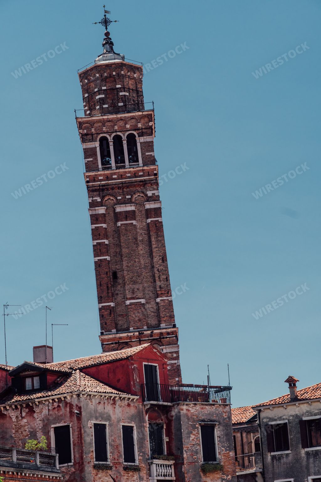 A vertical shot of the Campanile of Santo Stefano in Venice, Italy