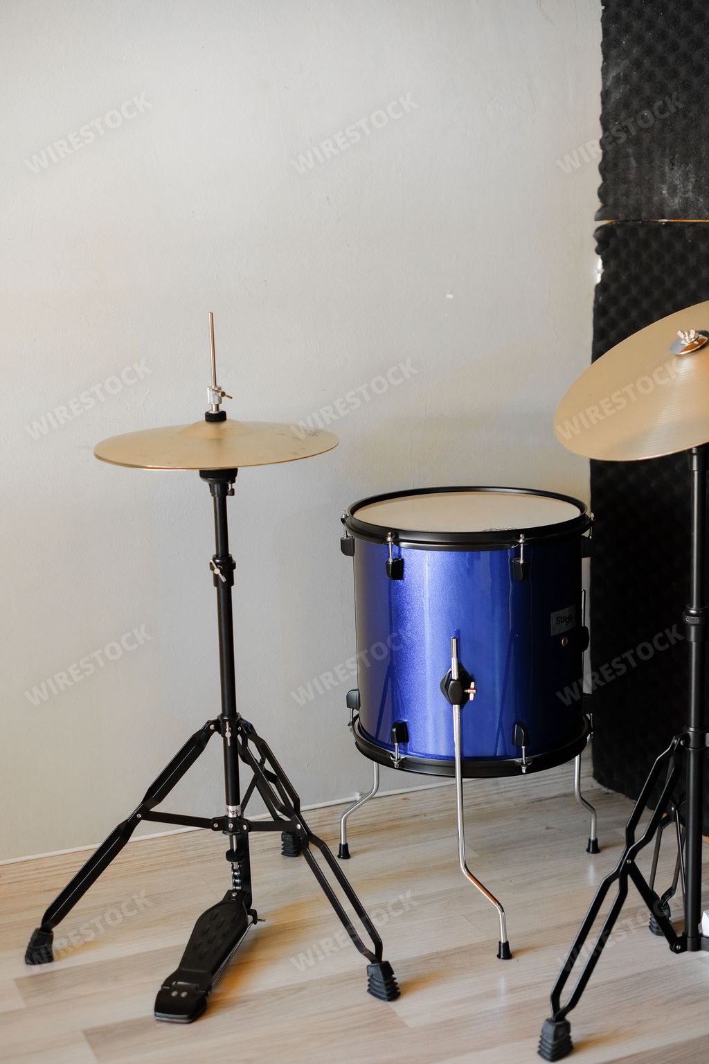 A vertical shot of drums in a studio