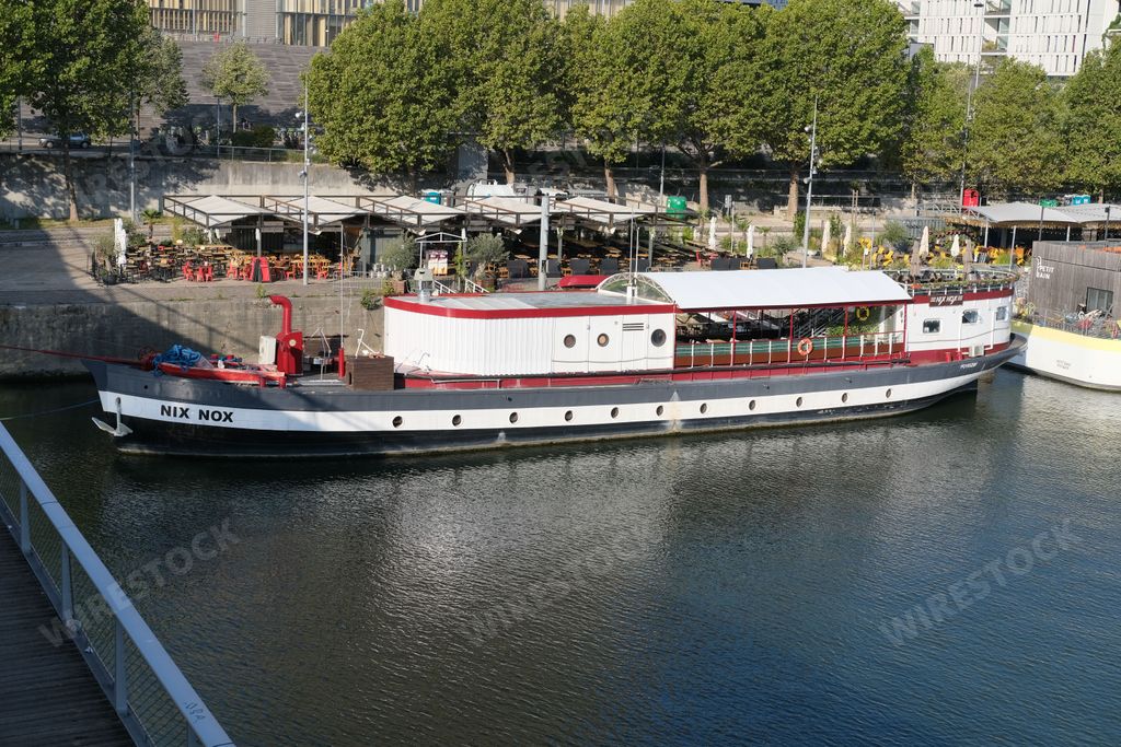 The Nix Nox boat on the dock of the Seine near the library Francois Mitterand in Paris, France