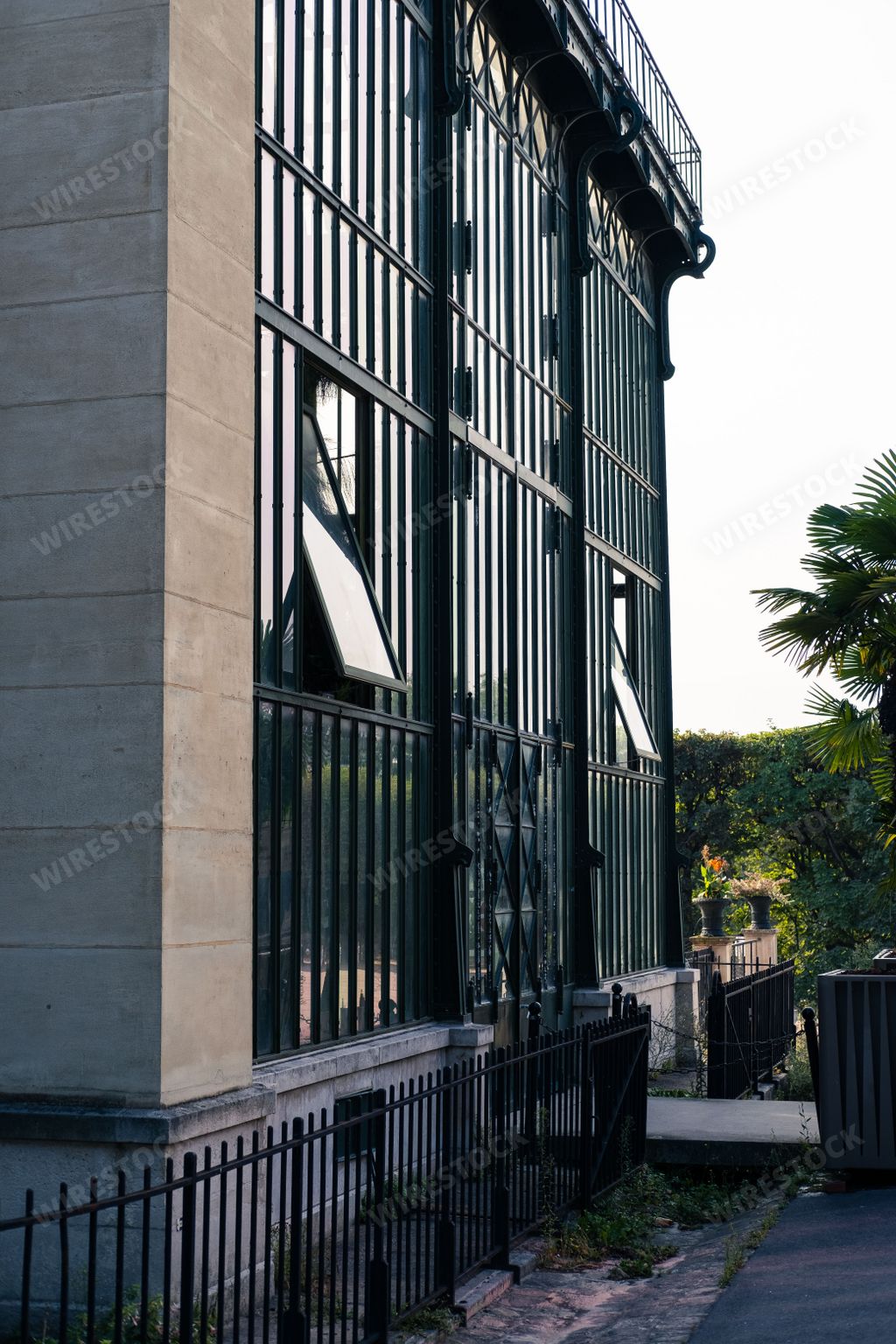 A vertical shot of a greenhouse in the Garden of Plants in Paris, France