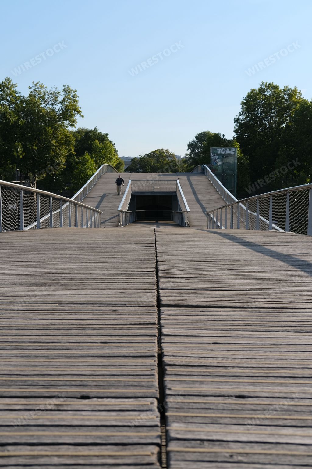 A vertical shot of the Simone de Beauvoir Bridge in Paris, France