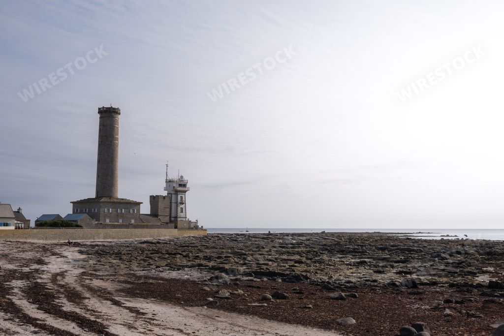 The iconic lighthouse situated on a stretch of shoreline of Penmarch, Britanny