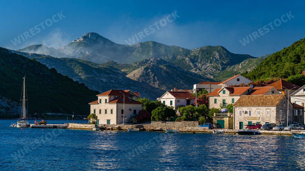 A beautiful shot of a Kamenari village with the view of Adriatic sea taken in Montenegro