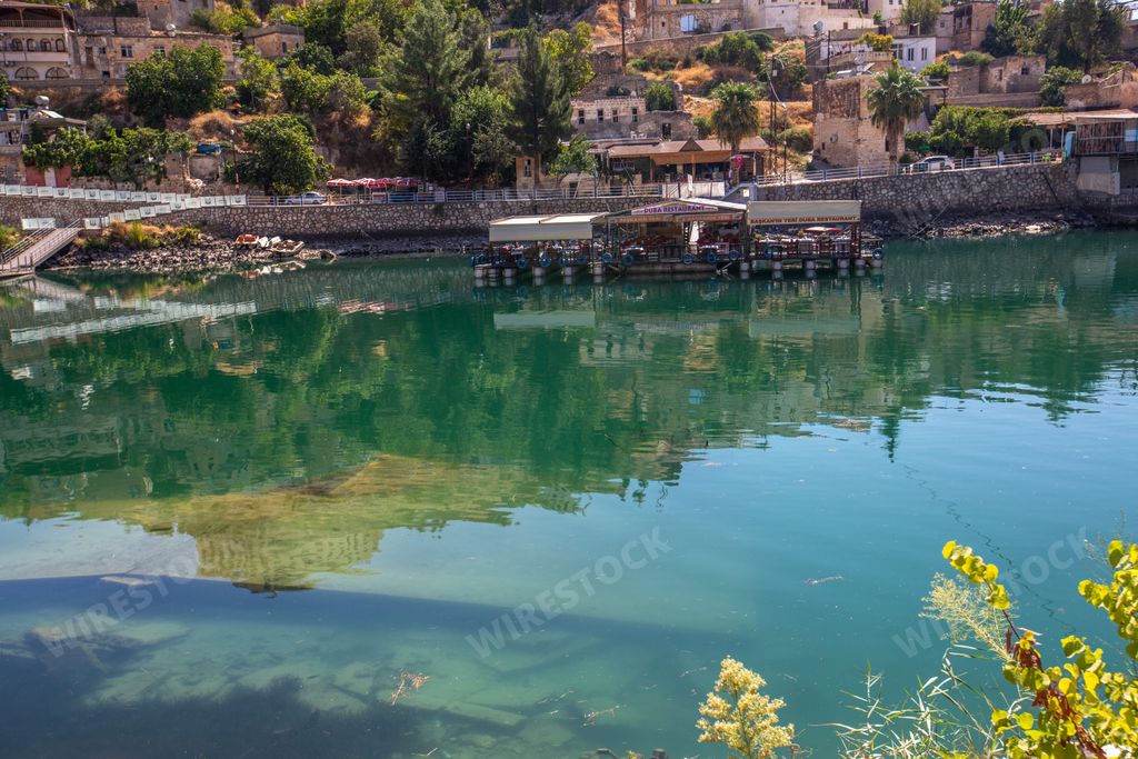 The reflection of the Sanliurfa sunken city in the water reservoir