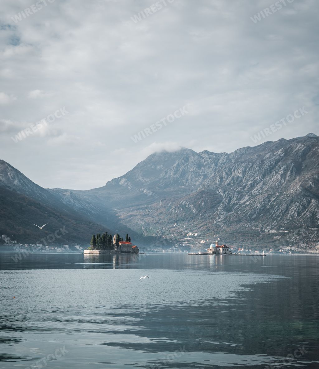 A scenic view of Sveti Dorde and Lady of the Rocks Islands in the Adriatic Sea in Perast, Montenegro