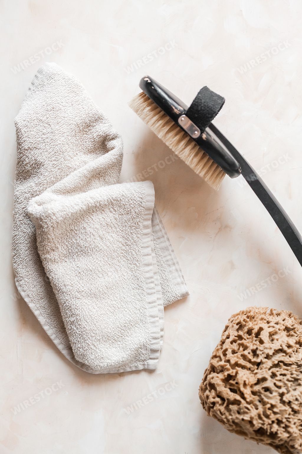 A vertical top view of plastic-free zero waste bathroom supplies for personal hygiene