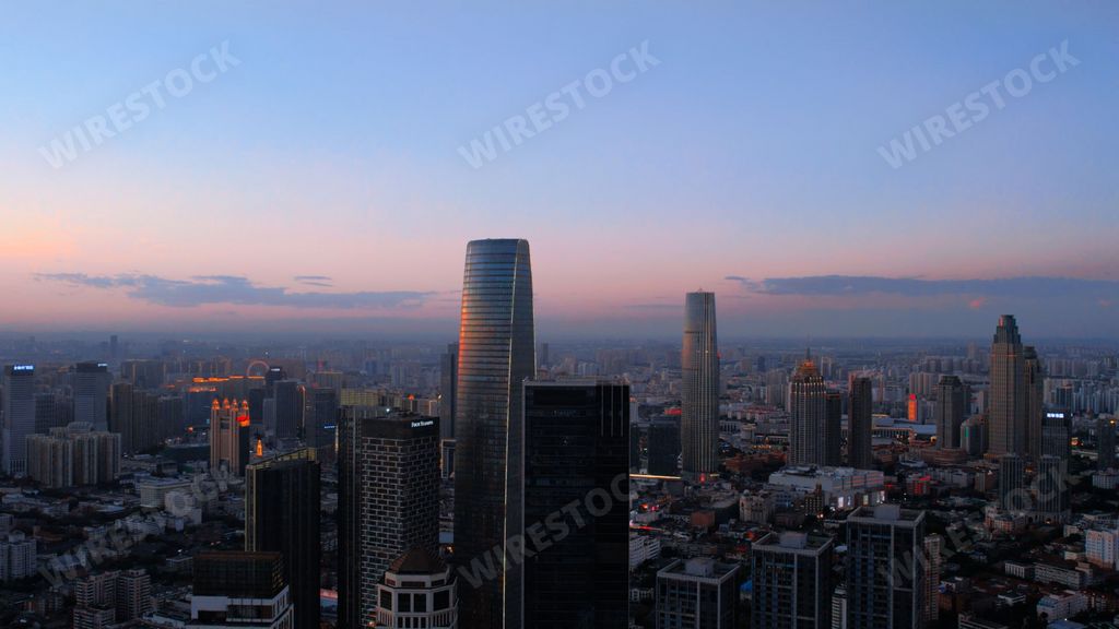 An aerial view of TianJin skyline on pinkish-blue sunset sky background in China